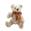 Witte teddy beer in mohair met een grote bruine strik.